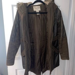 Olive green winter jacket with faux fur hood